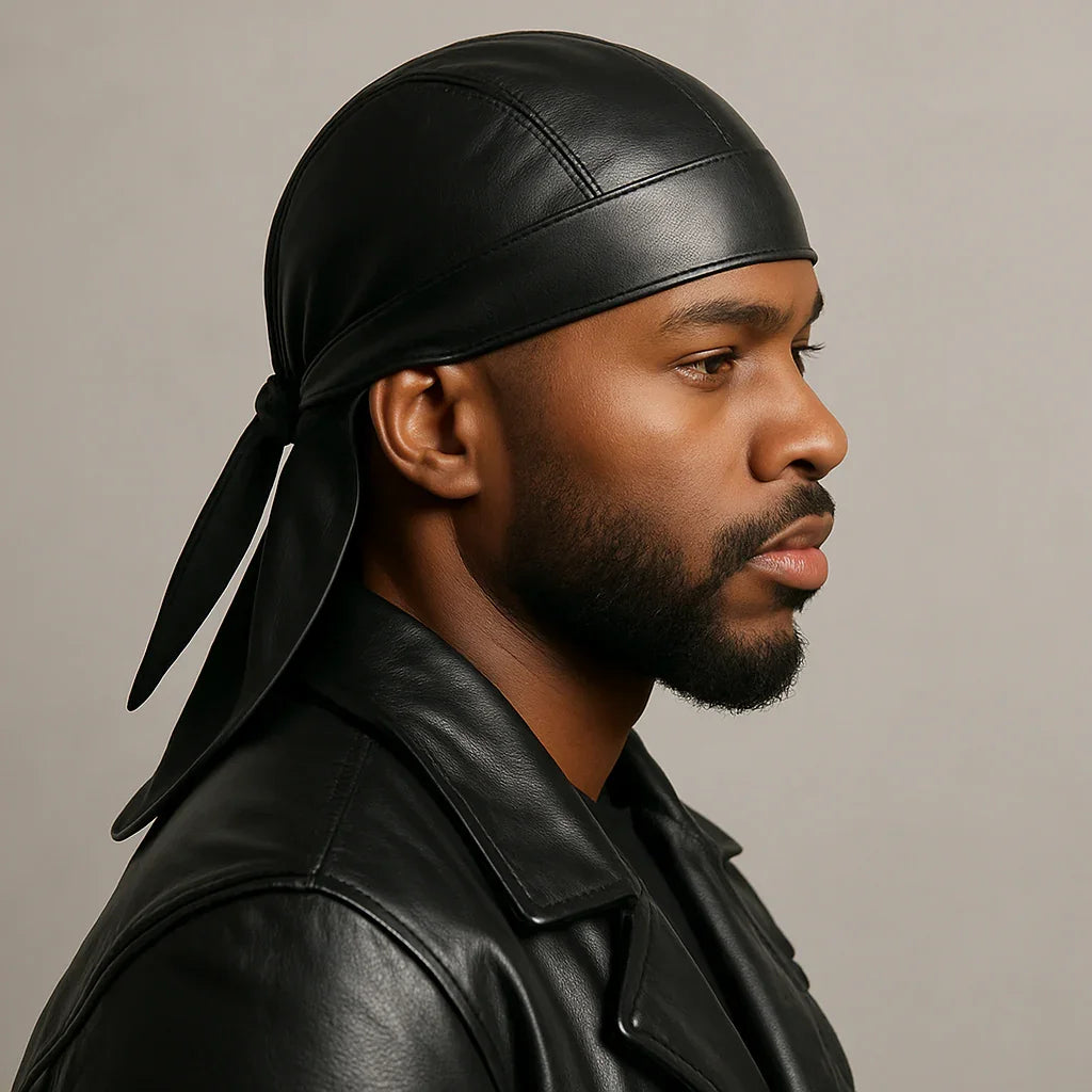 Close-up of a person wearing a black leather durag styled with a biker jacket, showcasing a bold and fashionable streetwear look