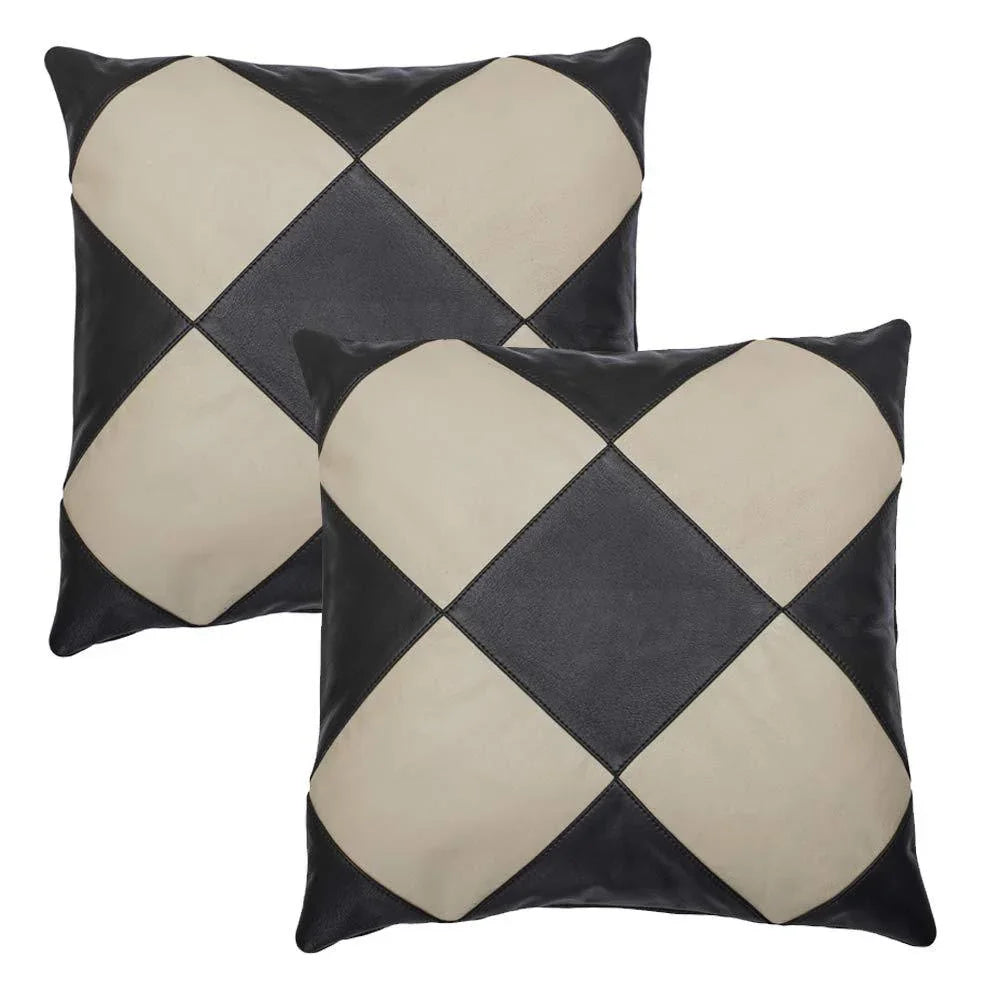 pair of black and cream diamond leather cushion covers -