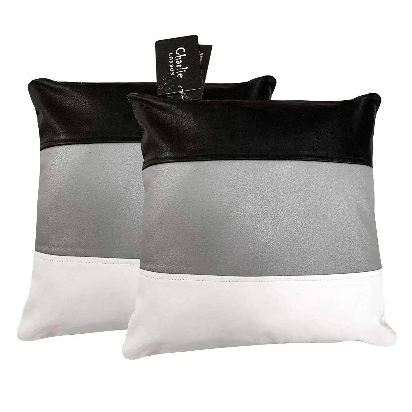 pair of striped grey and white real leather cushion covers -